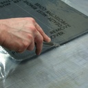 Protecteur de tapis de sol auto-adhésif